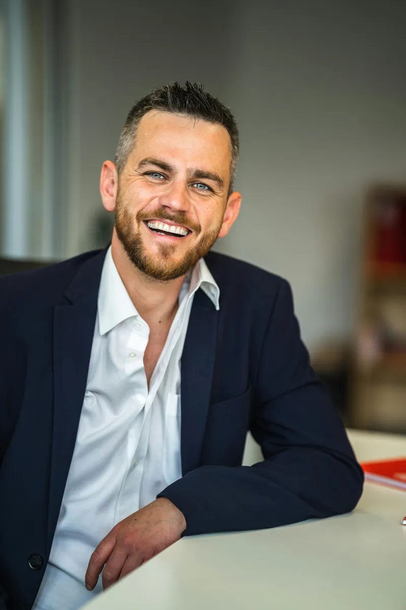 Portrait of James Carter, Senior Consultant at StratEdge Consulting, specializing in business strategy and operations.