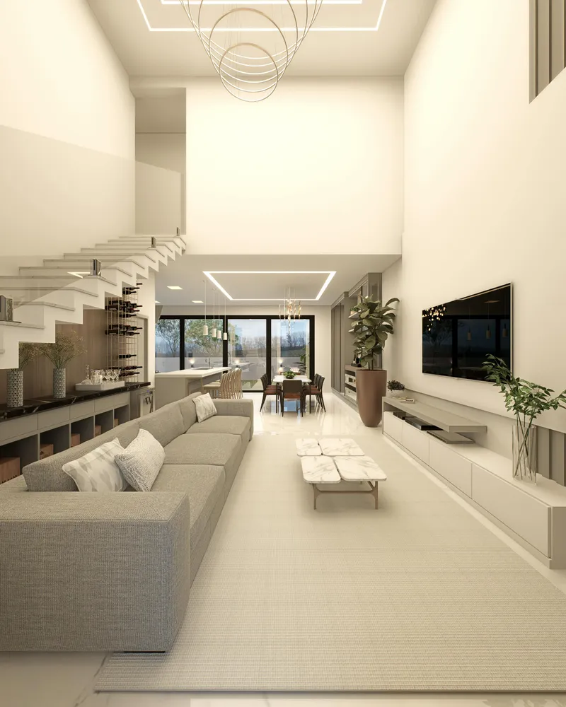 Sala de estar contemporânea em plano aberto com sofá neutro, mesa de centro de mármore e detalhes modernos de decoração